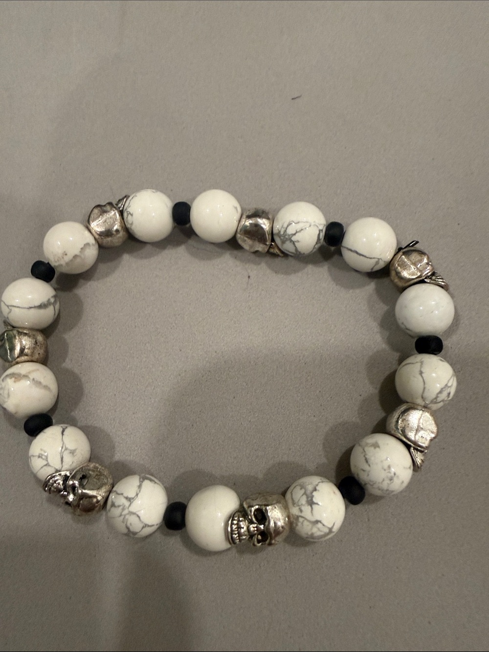 White Howlite Beaded Stretch Bracelet with pewter skull Accent Beads